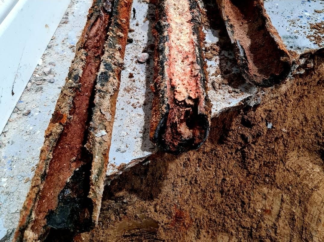 Failed cast iron sewer pipe removed from service