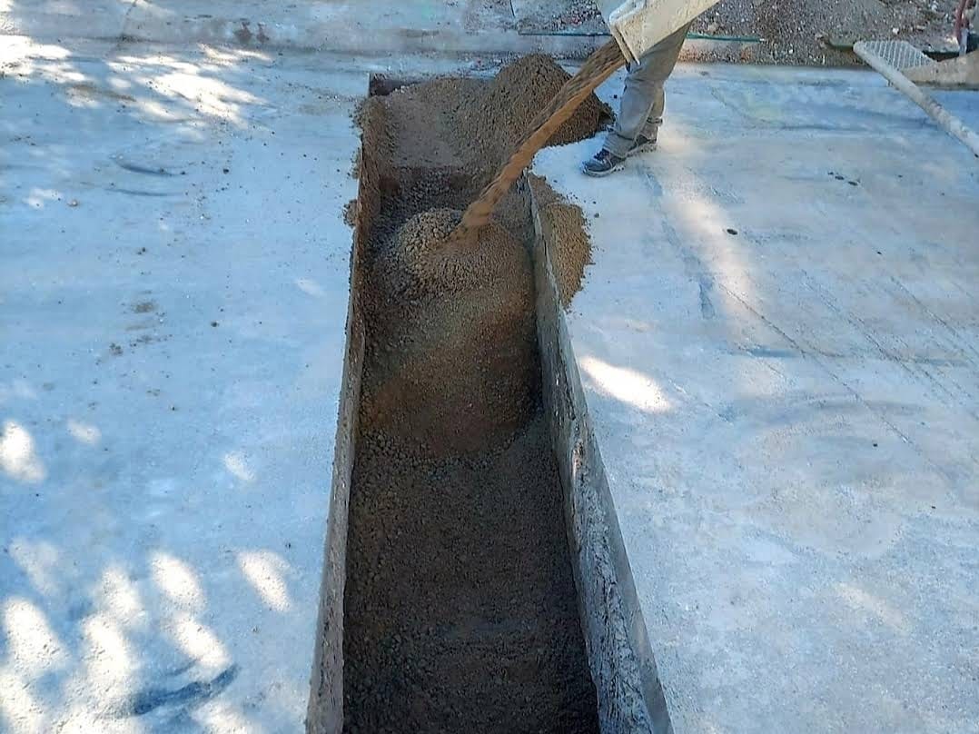 Trench backfilled before concrete restoration